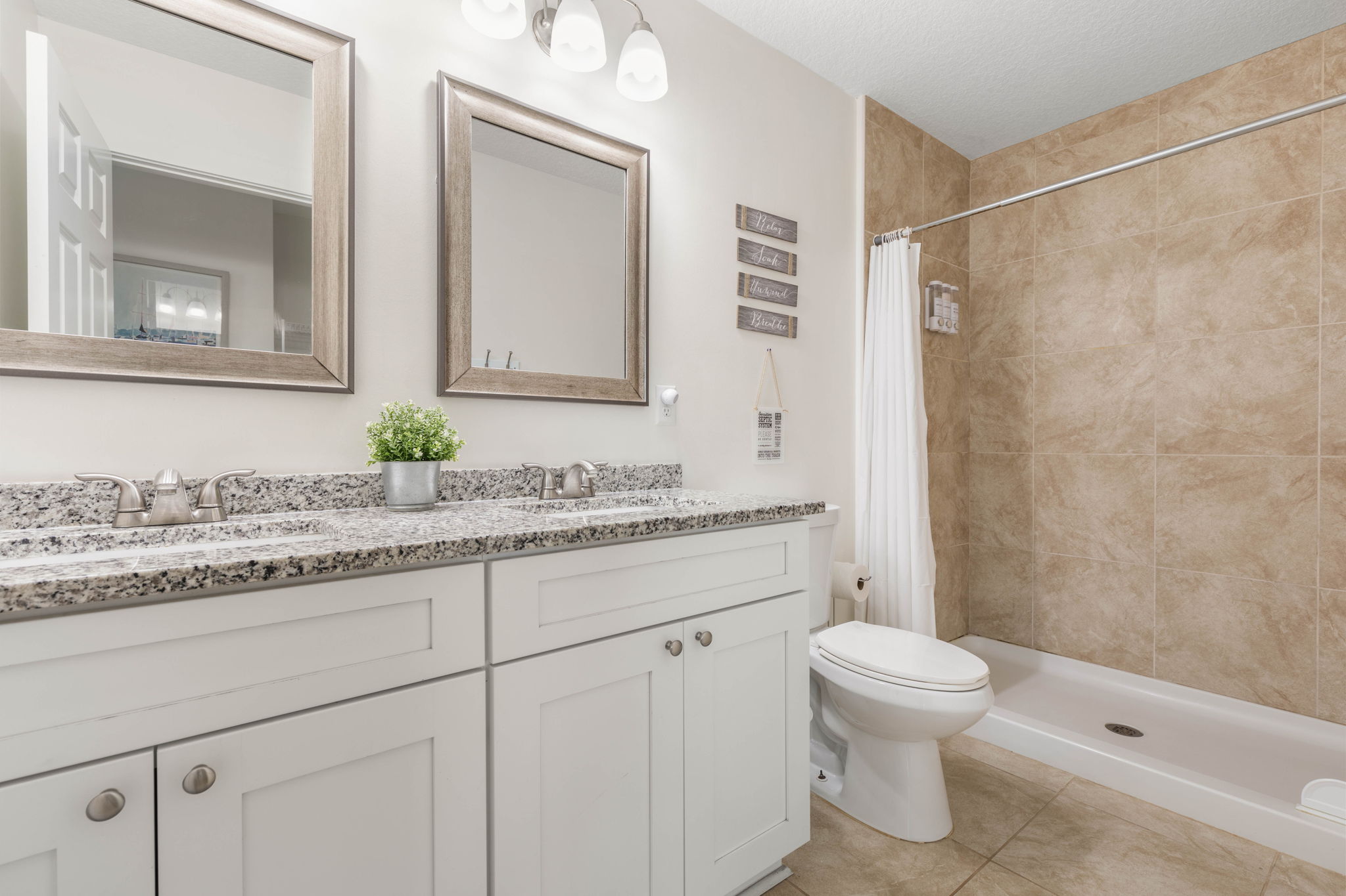 Bright natural light and open layouts create an airy coastal feel throughout the property.