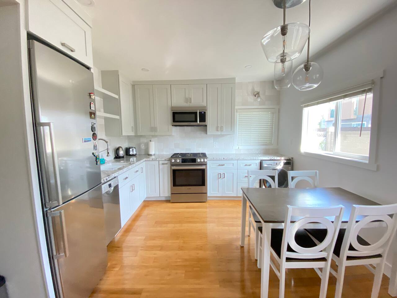 Fully equipped modern kitchen with stainless steel appliances and everything you need for cooking at home.