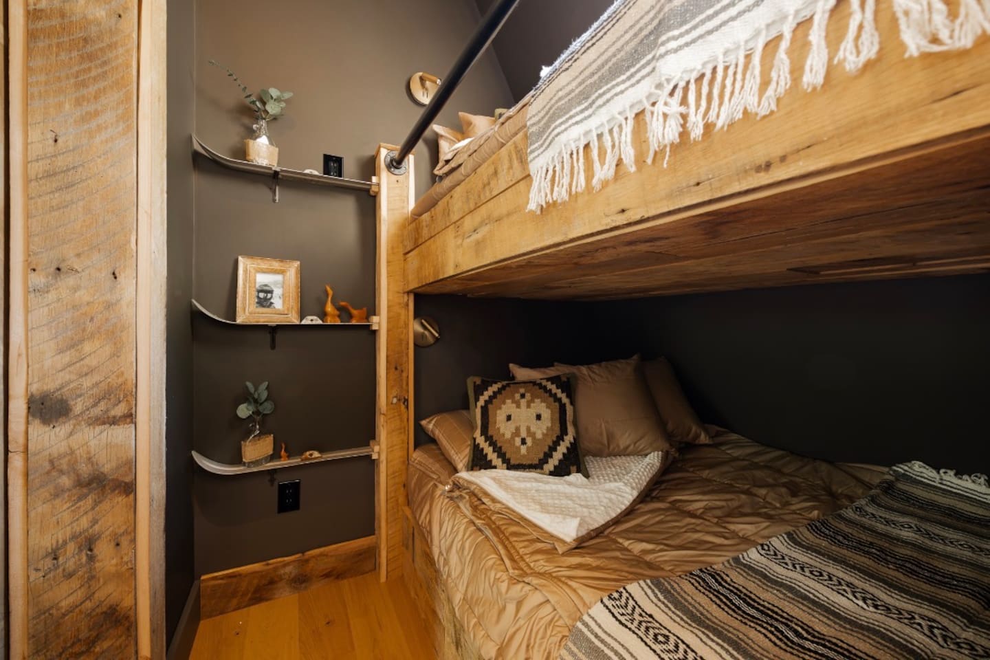 Open loft-style bedroom with private twin-over-queen sleeping area. 