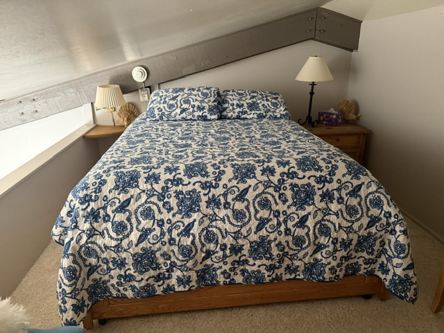 Queen bed in loft