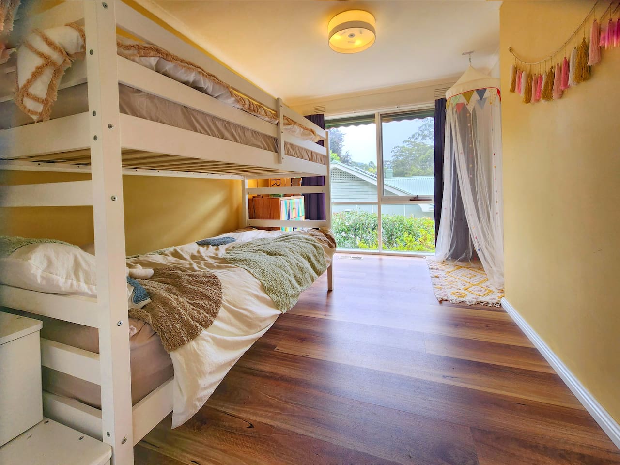 A refresh of photos are needed here! All for the better. Adults are welcome, but the double-bunk room has been setup primarily with kids in mind. There are books, fluffy toys, lego and plenty to ensure the littlies are happy and entertained.