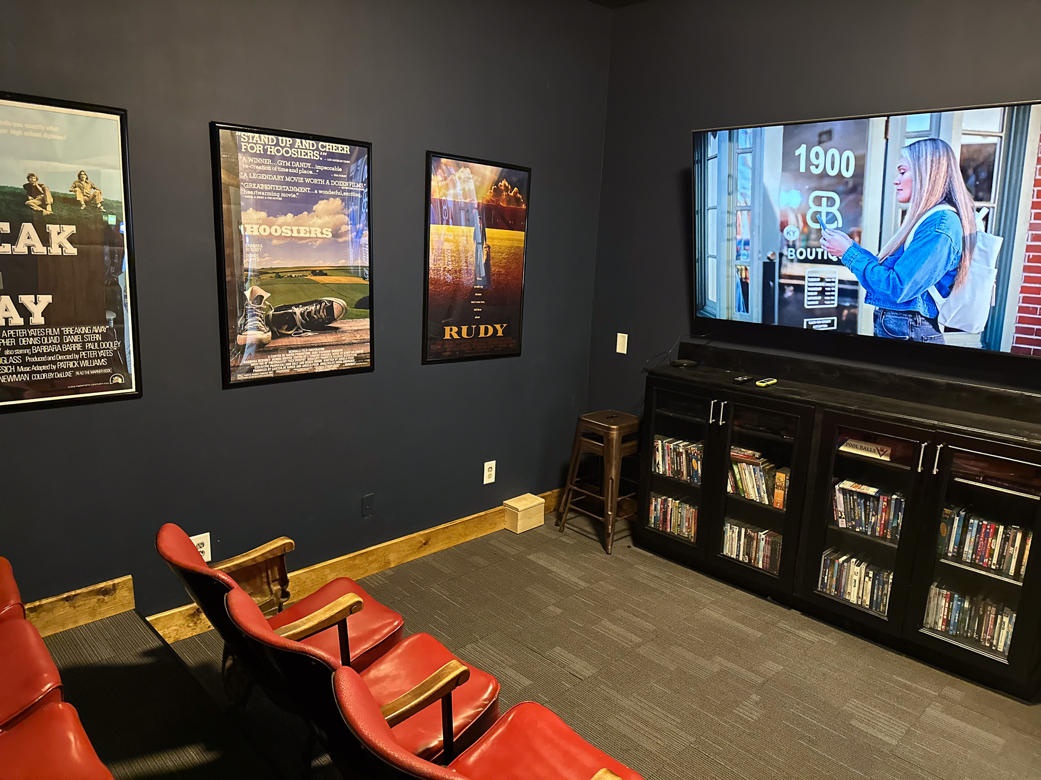 Authentic 100-year-old theater seating meets modern entertainment. Whether it's a movie night on the big screen or a game of pool, there's space for everyone to play.