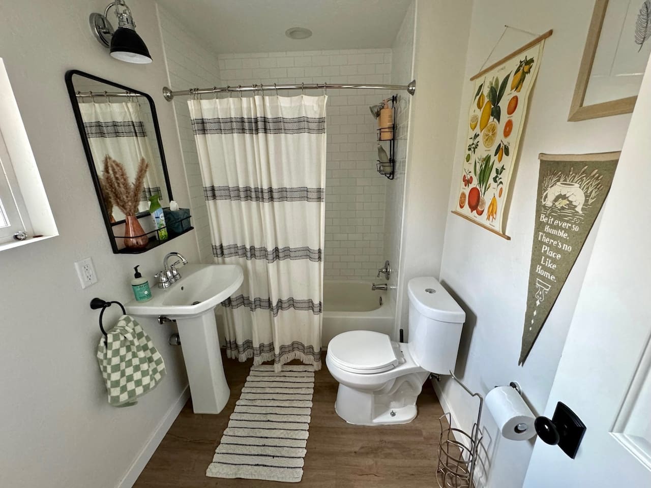 This bathroom off the main floor features a full shower and bath. 