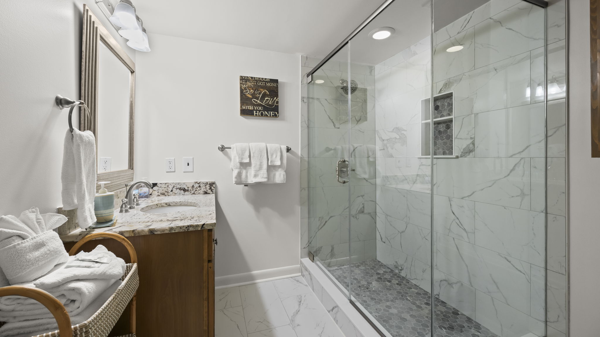 Guests will appreciate the loft en suite in our Cotton Bayou condo, featuring a full, large shower and a modern design. This private bathroom adds comfort and convenience to the spacious loft with double beds.