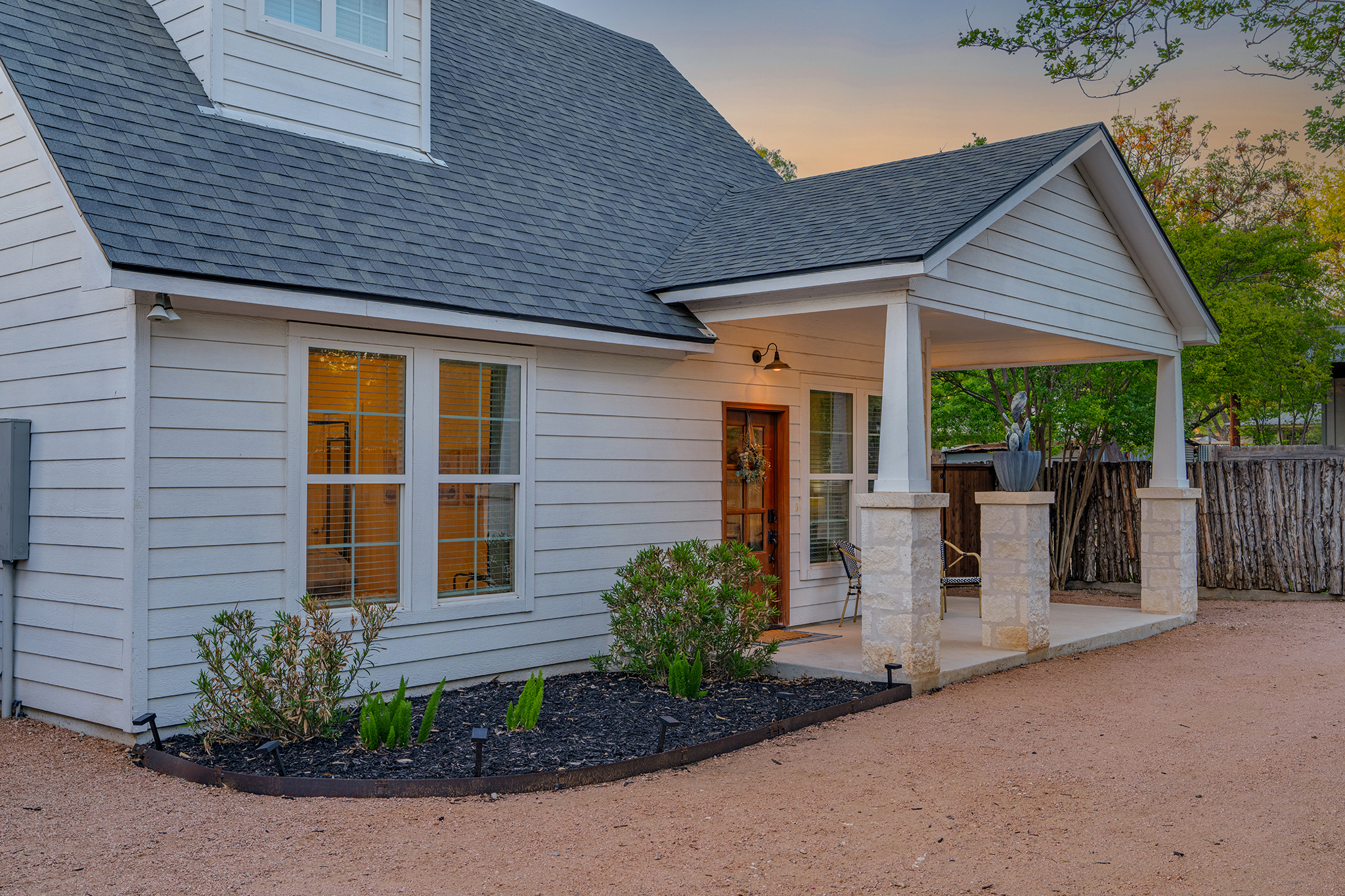 Welcome to your charming Fredericksburg retreat with a spacious front porch.