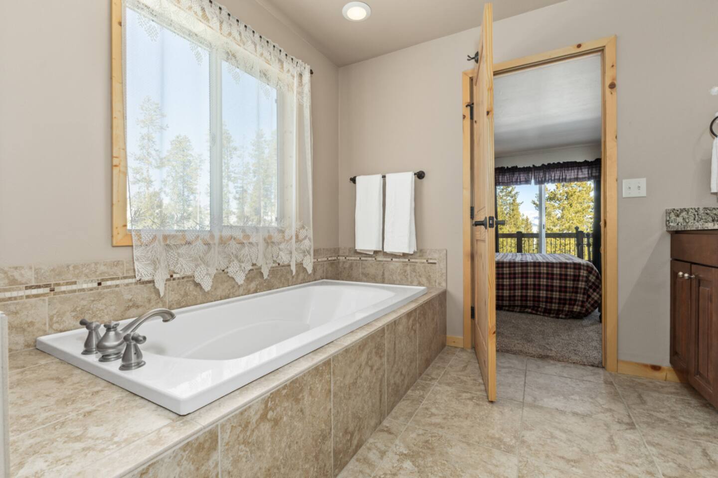 Ensuite Bedroom #1 – Tub | Shower | Dual Sinks