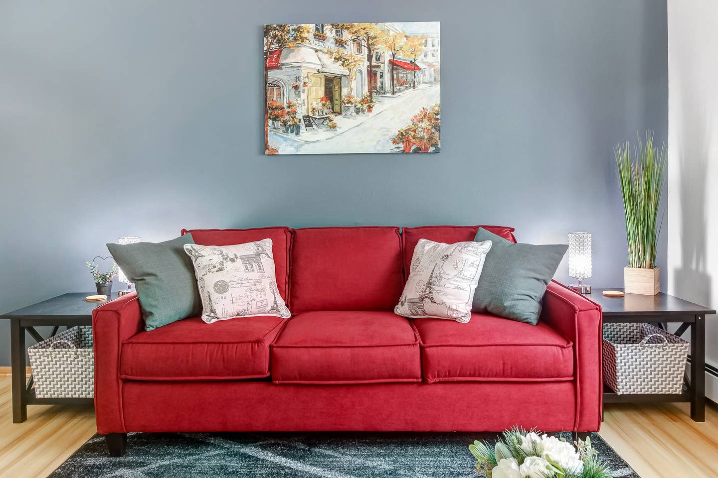 Relax on a stylish sofa or pull out the  Queen sofa bed for additional sleeping accommodations. Extra sheets located in baskets to side of couch.