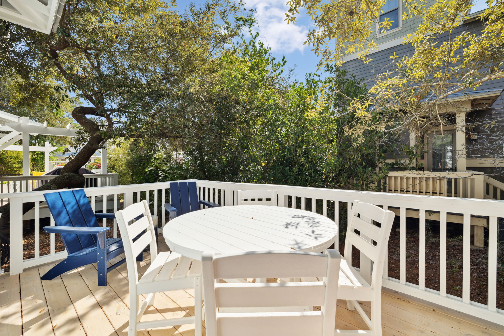 Backyard deck with outdoor dining seating