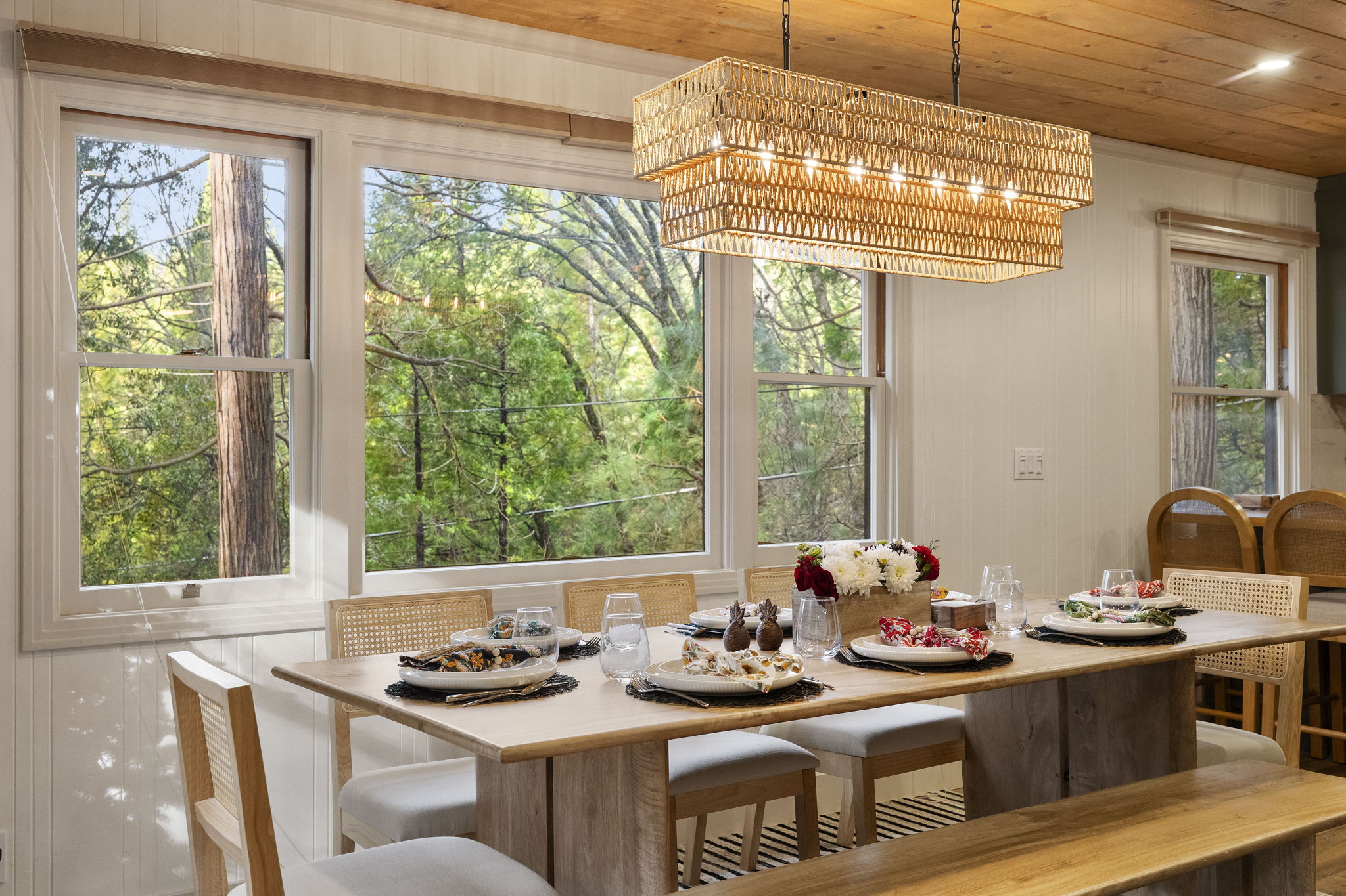 Dining table for up to 10. Up to 6 chairs and a large bench is available for seating. Plenty of dishes for your large groups as well. The most beautiful views to enjoy.