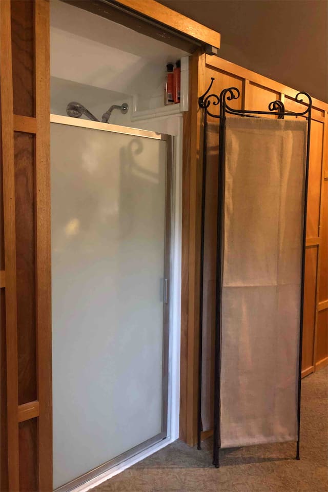The shower provides endless hot water with our new tankless water heater.  Since the shower is not enclosed, guests should be limited to 2-3 very close friends.  