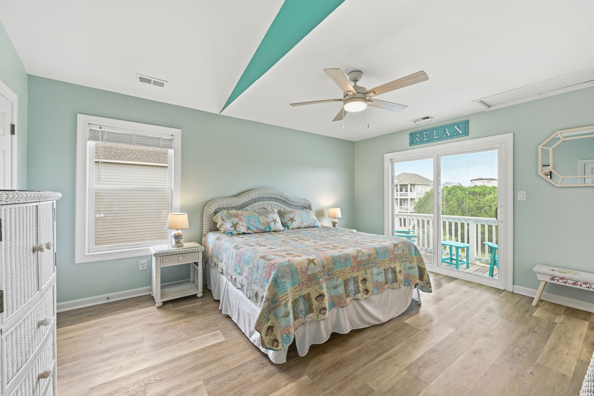 A fourth bedroom - a restful king suite that opens to the outdoors for true relaxation