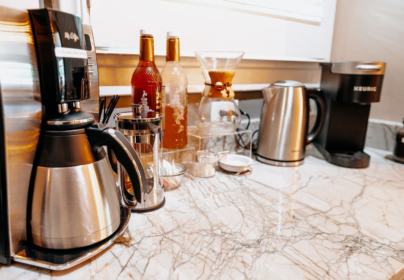 Coffee Lovers Dream! Four different types of brew. Drip, Chemex, French Press & Keurig. Mix-ins & frother  to top off your morning brew.  If nothing here is to your liking, Extra Fine,  a fabulous bakery and coffee shop is directly across the street.