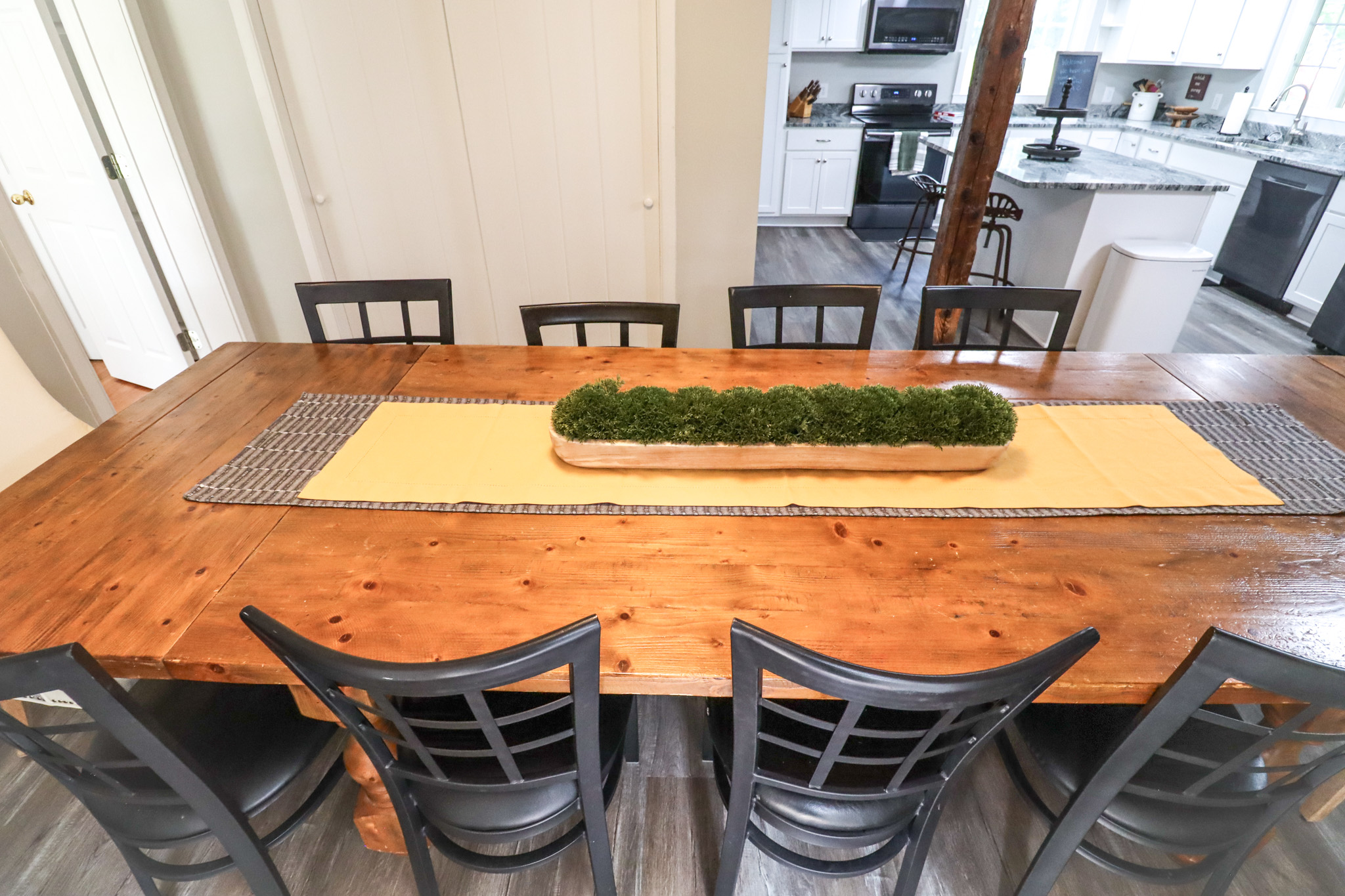Comfortably seat your group for home-cooked meals in this warm, open dining space