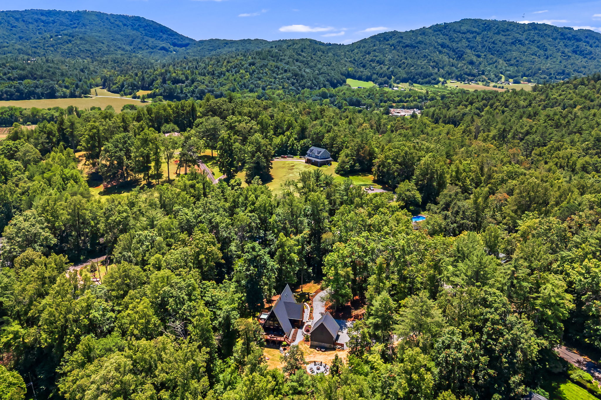 The A-Frame sits on beautiful 2 acres and its surrounded by mature trees, within a quiet neighborhood.