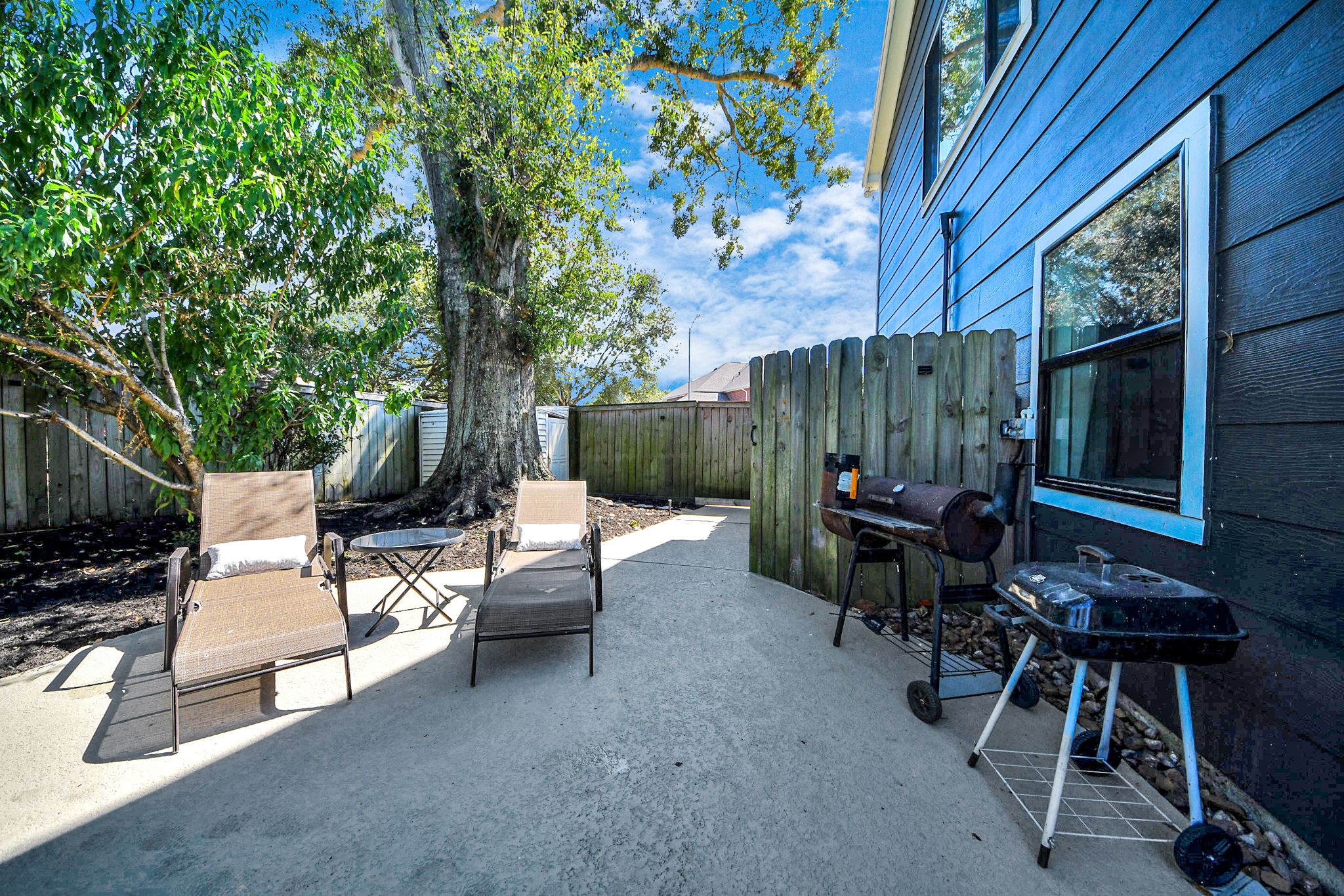 Sit back and enjoy the pool while your BBQ cooks on the charcoal grill!