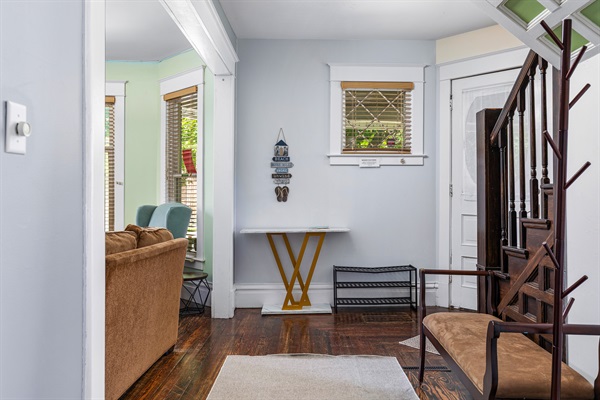 Stylish entry with warm wood tones and a seamless flow into the cozy living space.