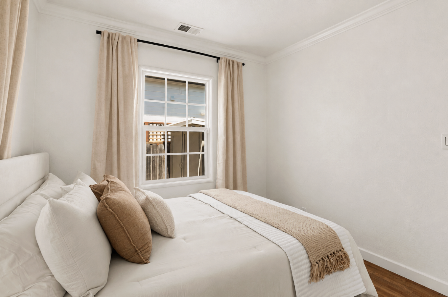 Peaceful queen bedroom designed for restful nights