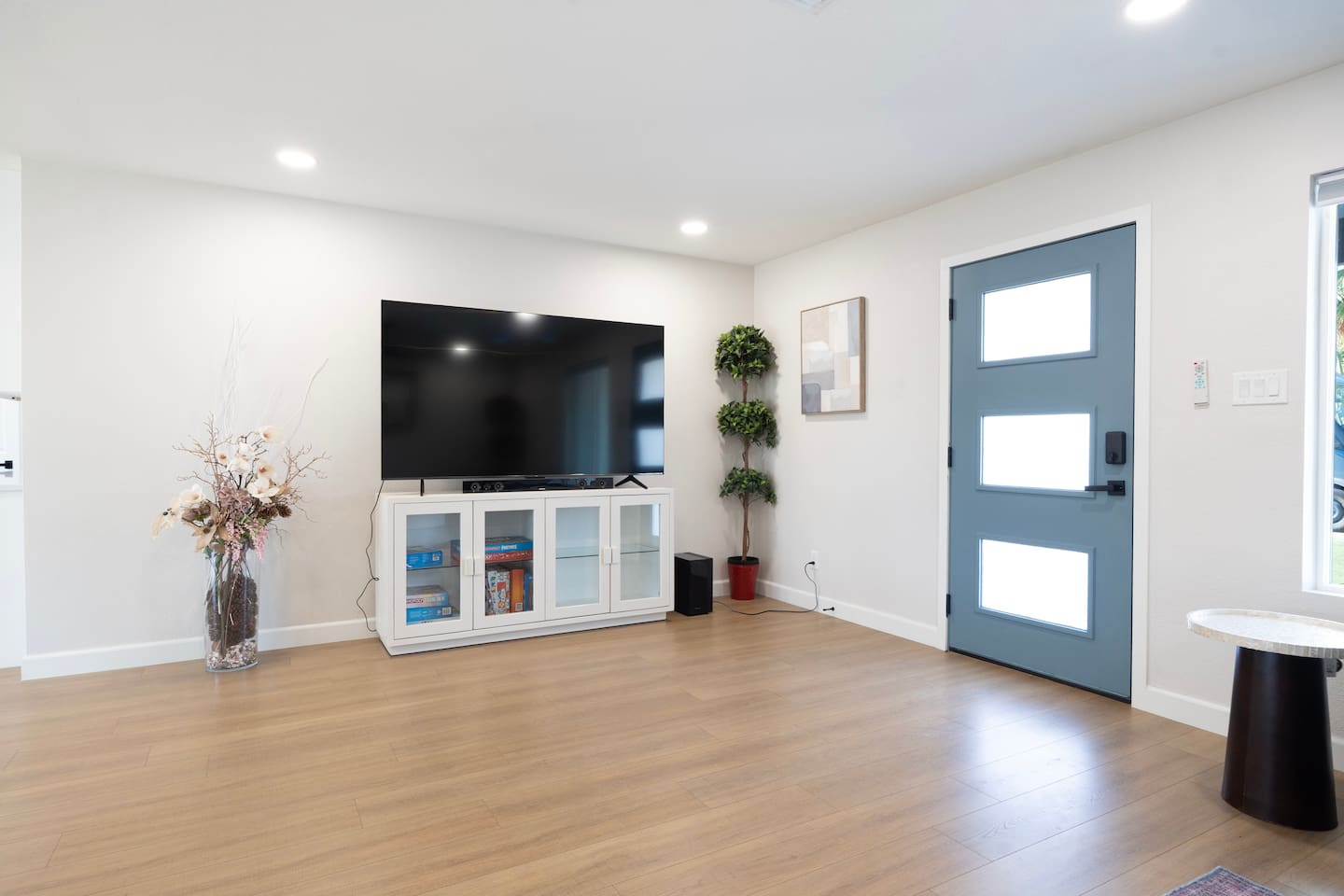 Spacious living area with large smart TV—perfect for movie nights and relaxing after a day exploring Scottsdale