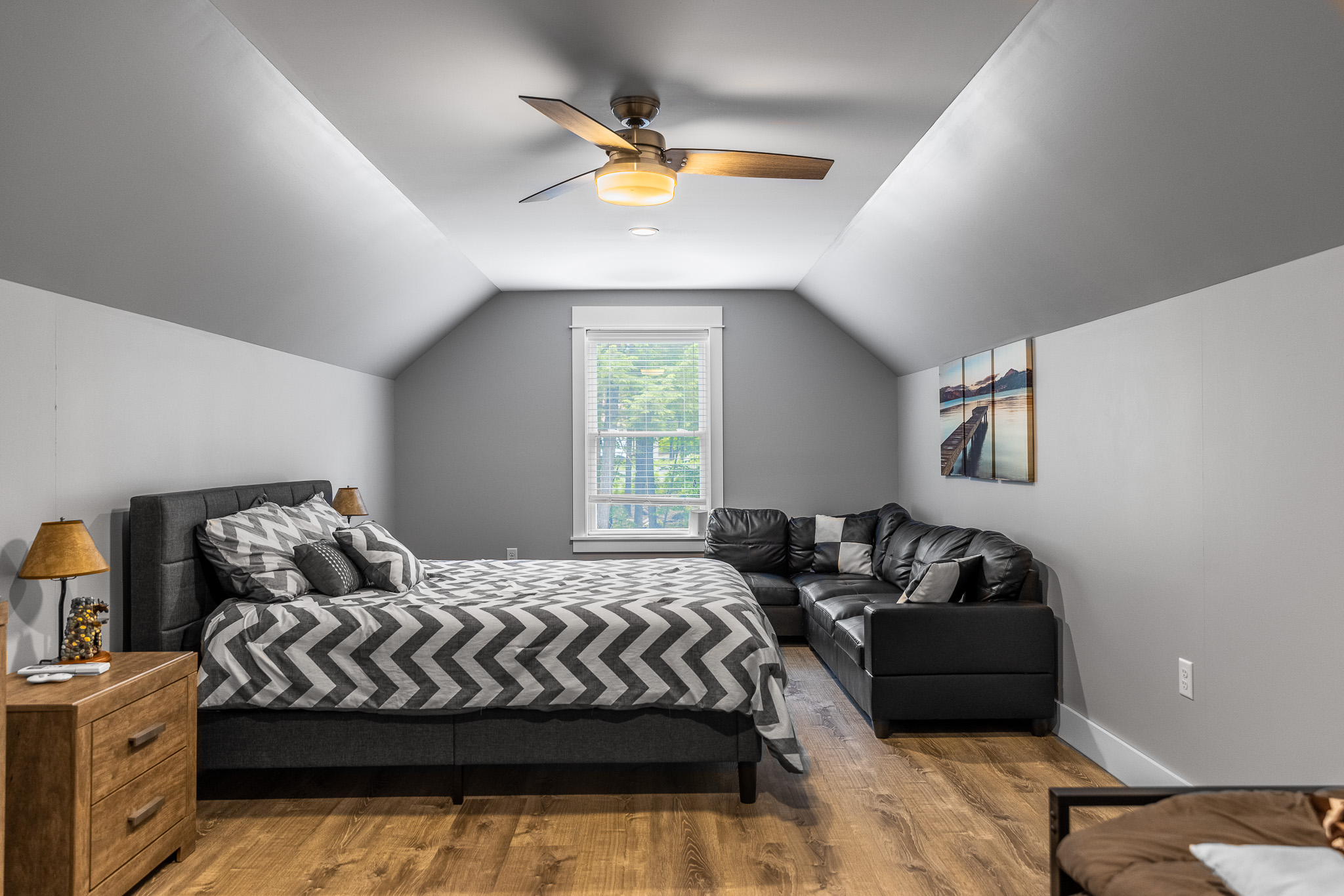The "Loft" above the garage available for additional rental with the house. It’s air conditioned and has 1 queen bed plus a twin day bed with a twin trundle.