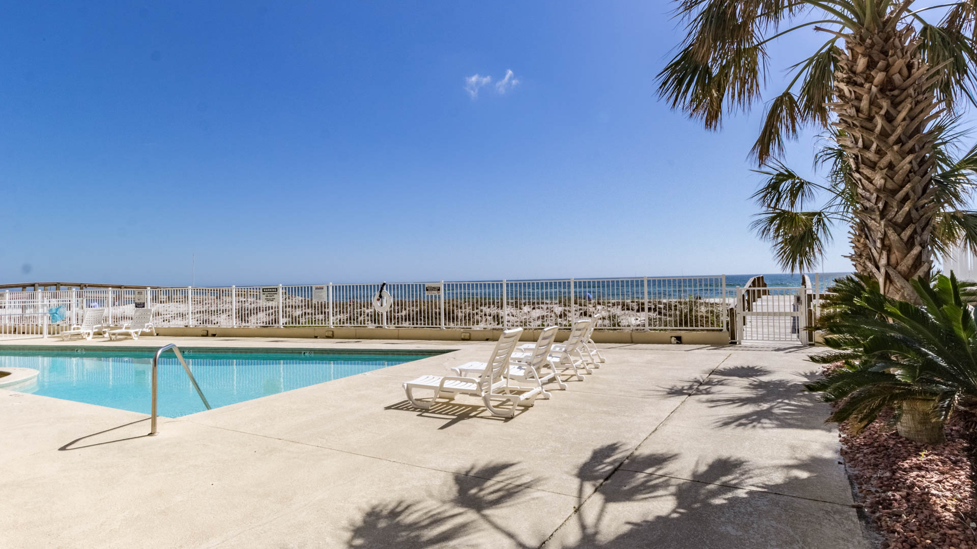 Private pool and direct beach access offer the ultimate coastal lifestyle.  Experience resort-style living at its finest.