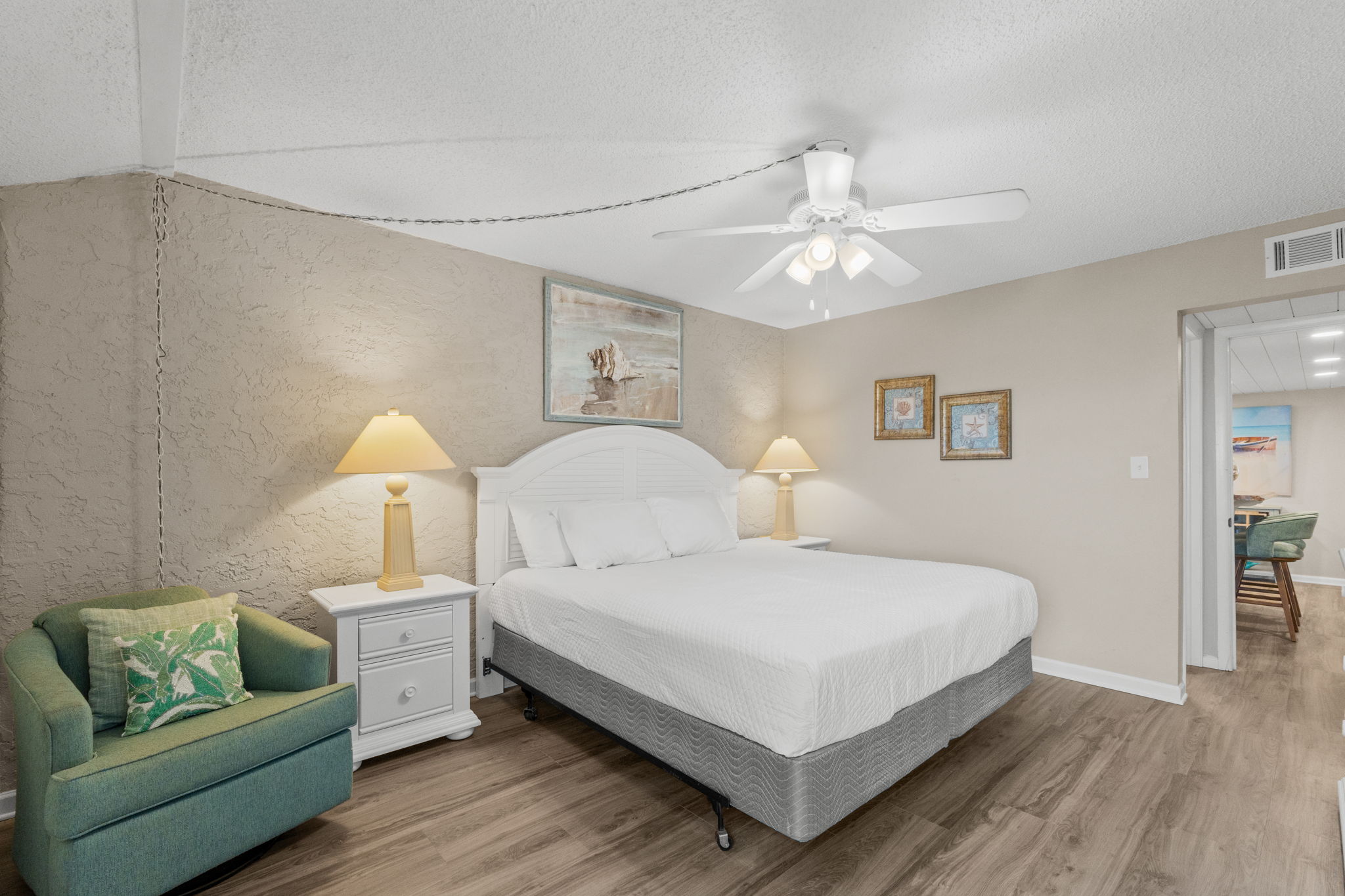Master Bedroom with King Sized Bed, Ensuite Bathroom, and Balcony Access
