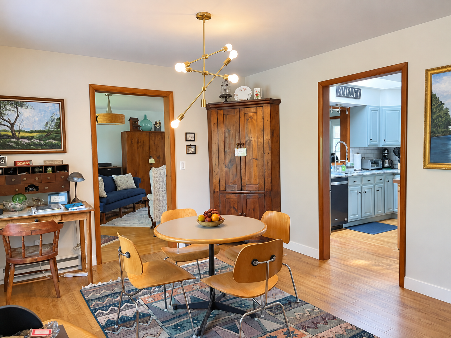 Dining room with views into the kitchen and living room.