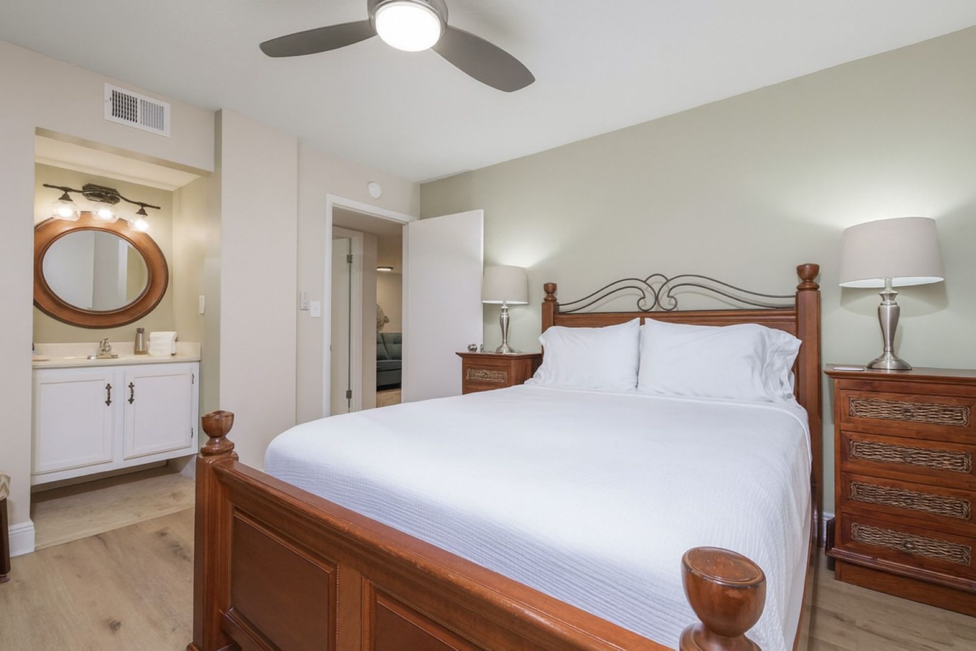 Queen bedroom with sink/makeup vanity