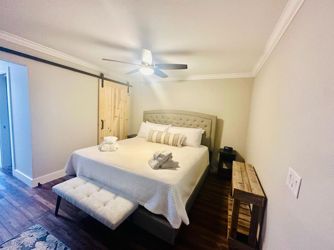 King bedroom with barn door