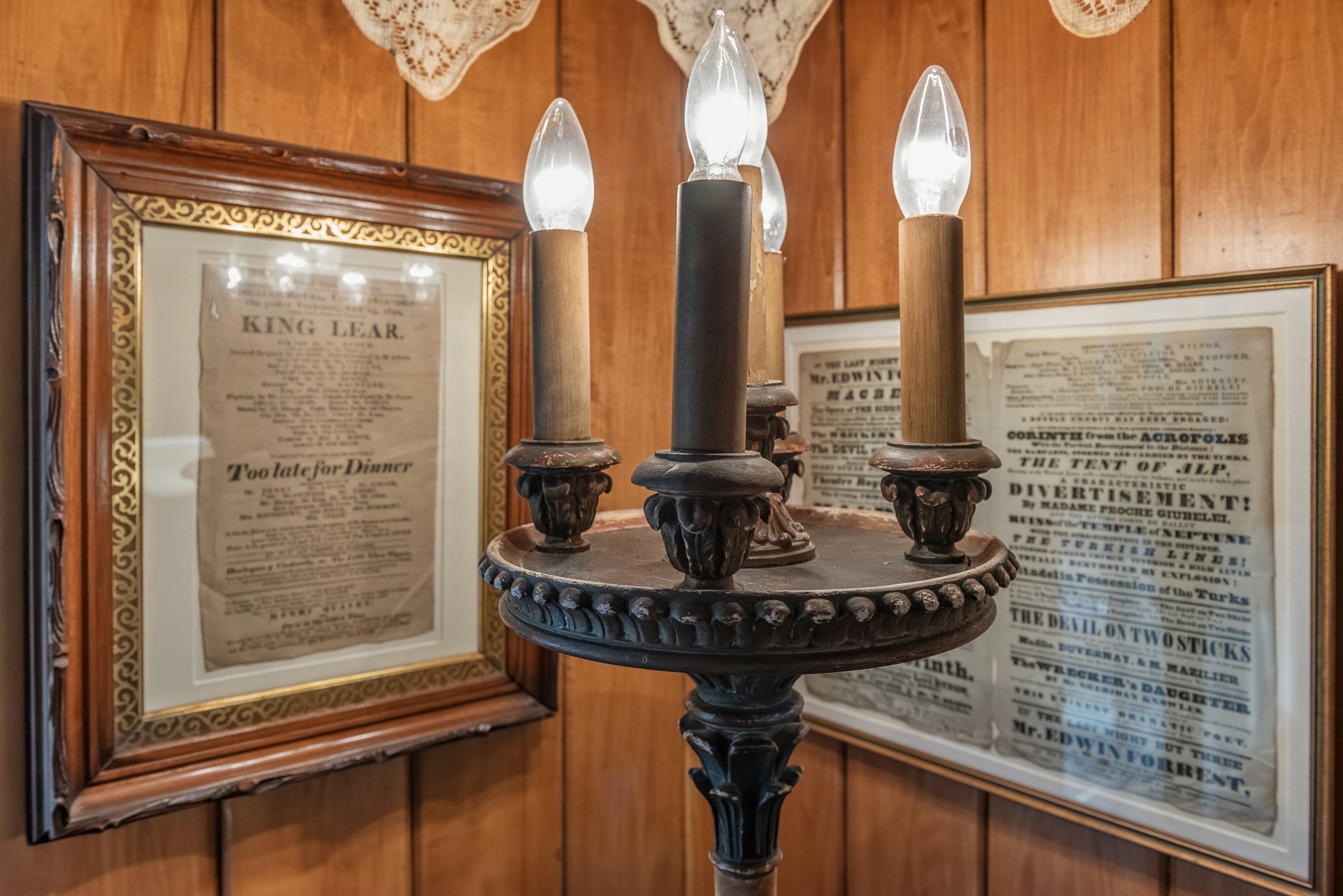 Decorative display w/ vintage pieces & soft ambient lighting