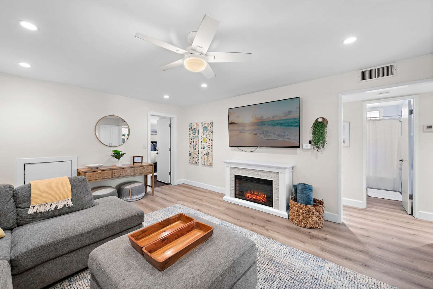 The living room also offers a fireplace and large-screen TV.