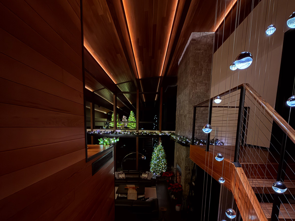 Stairs from the Primary Suite with Christmas lights view &mdash; Sunset Falls