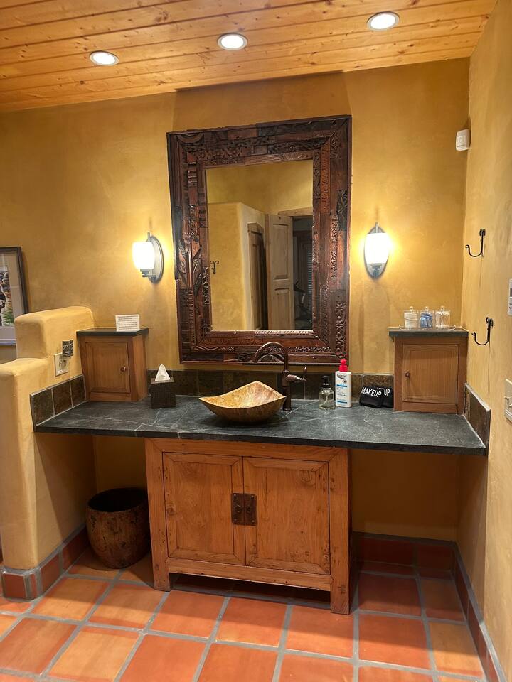 Bedroom two bathroom, single vanity and walk in shower.