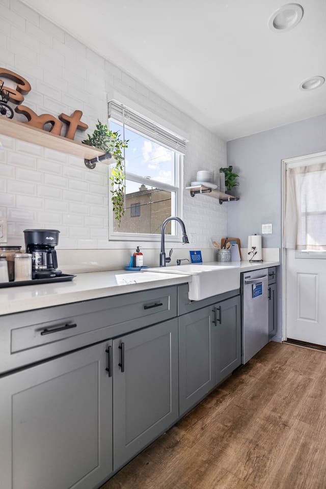 Stylish kitchen featuring a sleek sink and ample drawer storage beneath a beautiful granite countertop. Thoughtful design elements add elegance, creating a functional space that's perfect for cooking and entertaining in comfort and style.