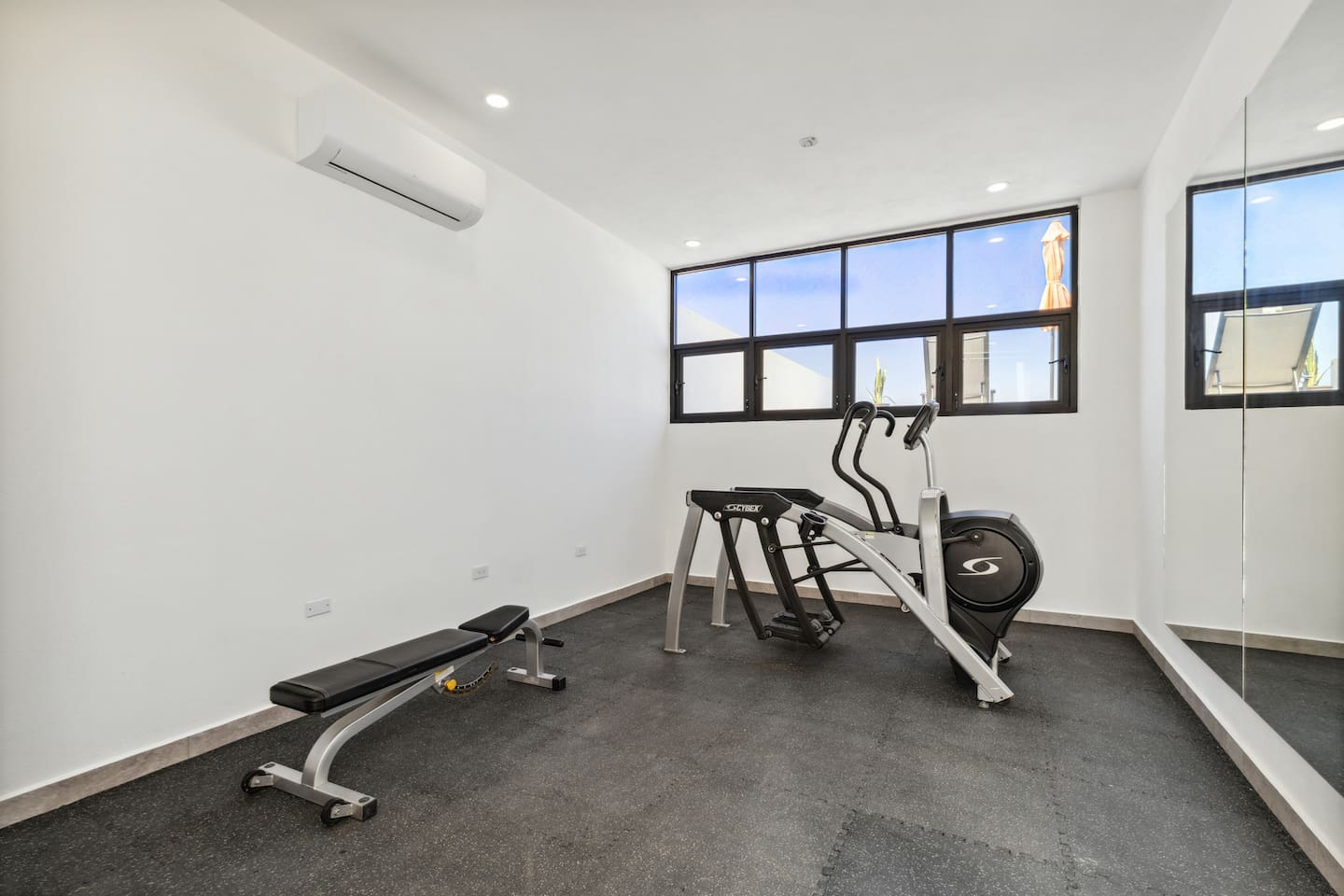 Maintain wellness with our elliptical machine, sturdy bench, dumbbells, and workout mat, designed to meet all your fitness needs.