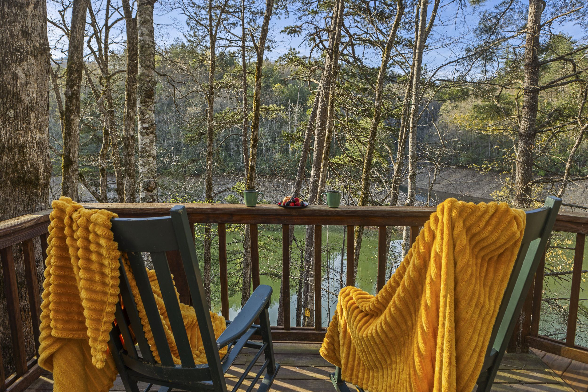 Deck: Sip coffee while soaking in serene forest and river views from your retreat!