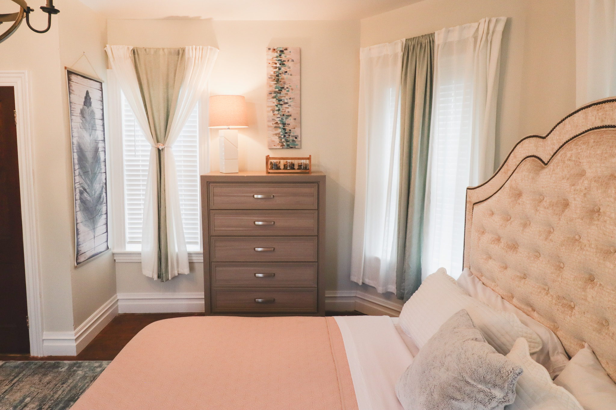 king bed in spacious front of the house room