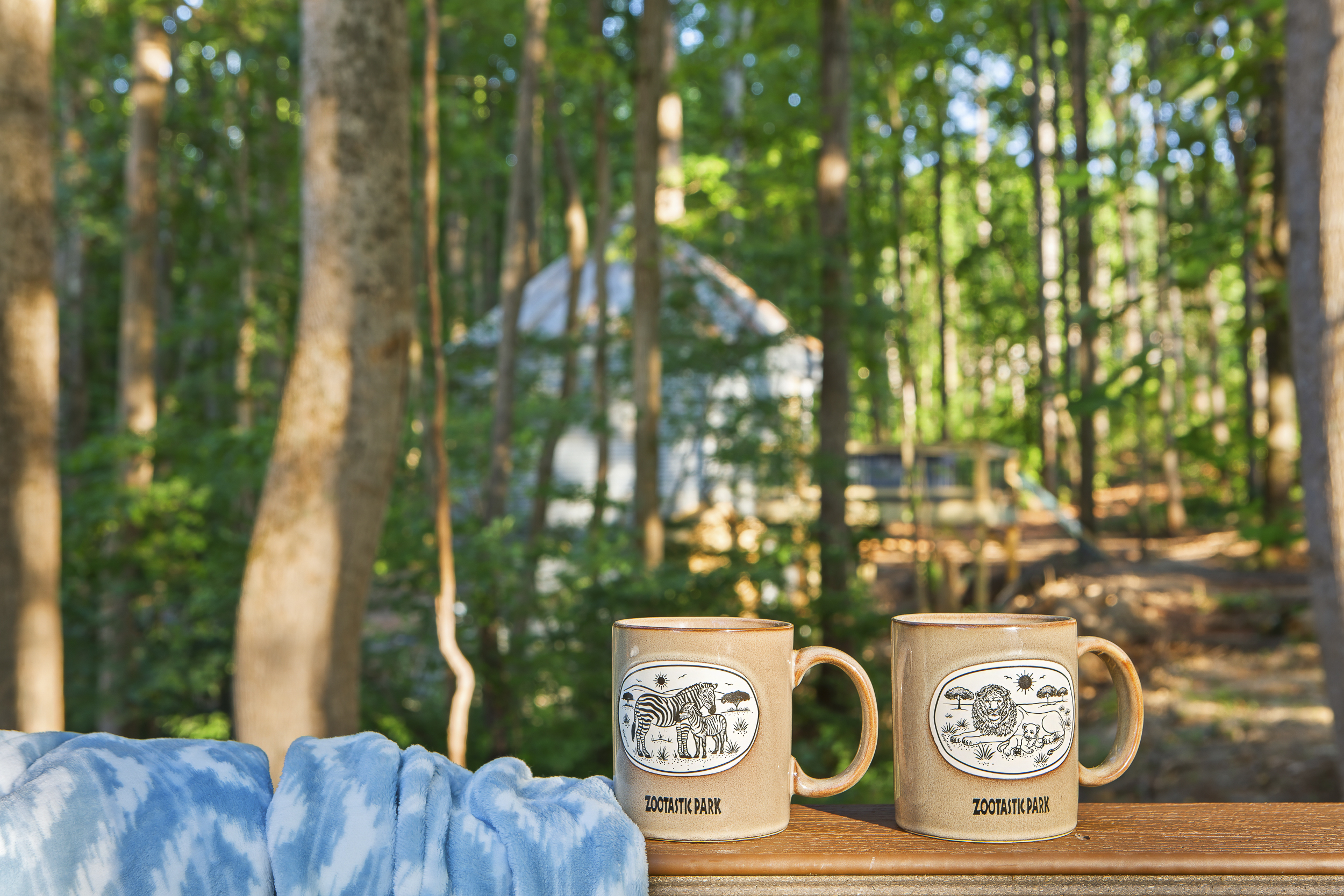 Outdoor Retreat: Sip morning coffee on the deck surrounded by lush woods and serene views!