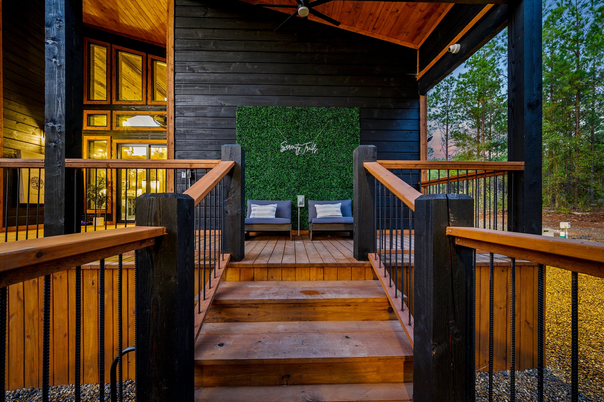Strike a pose at the custom Serenity greenery wall on our designer sunset deck.
