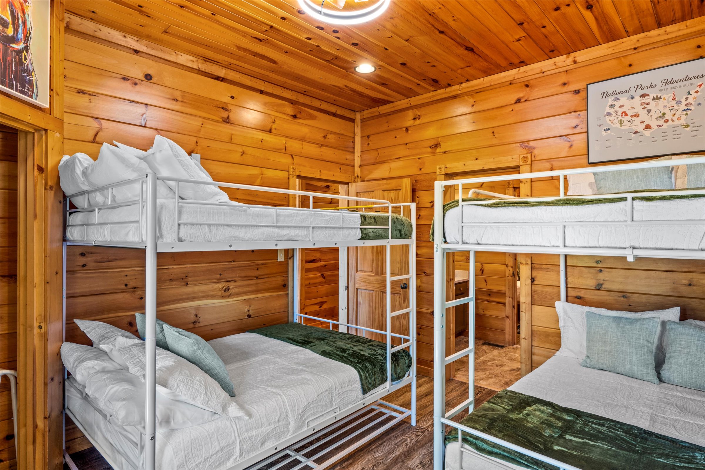 Bedroom 7 (downstairs) has two full over full bunk beds (fits up to 8 kids) and shares a bathroom with Bedroom 6.