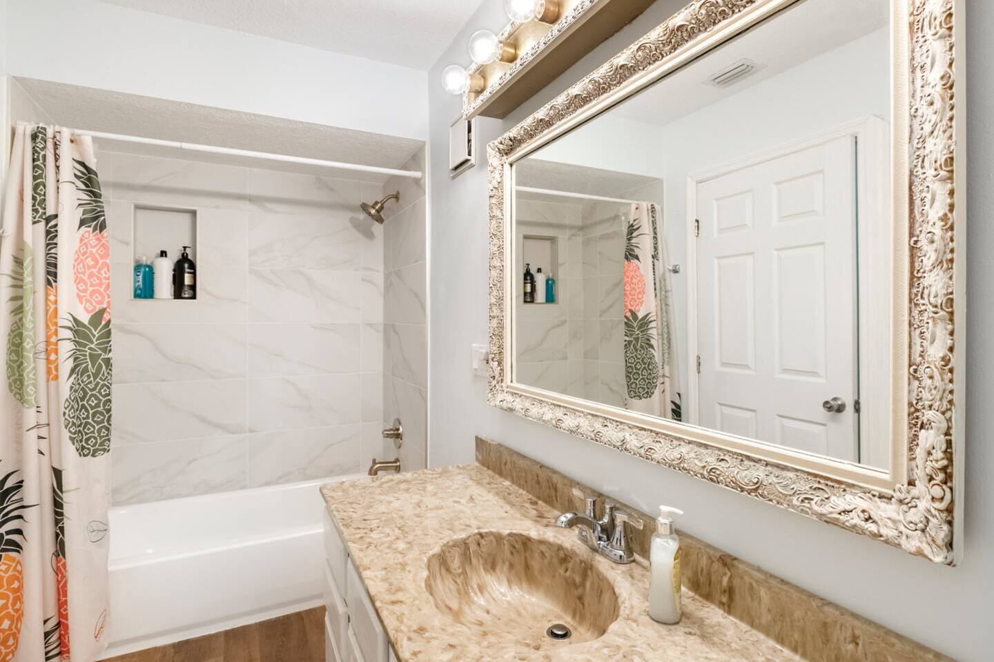 Pineapple Themed 2-Queen Suite private bathroom.