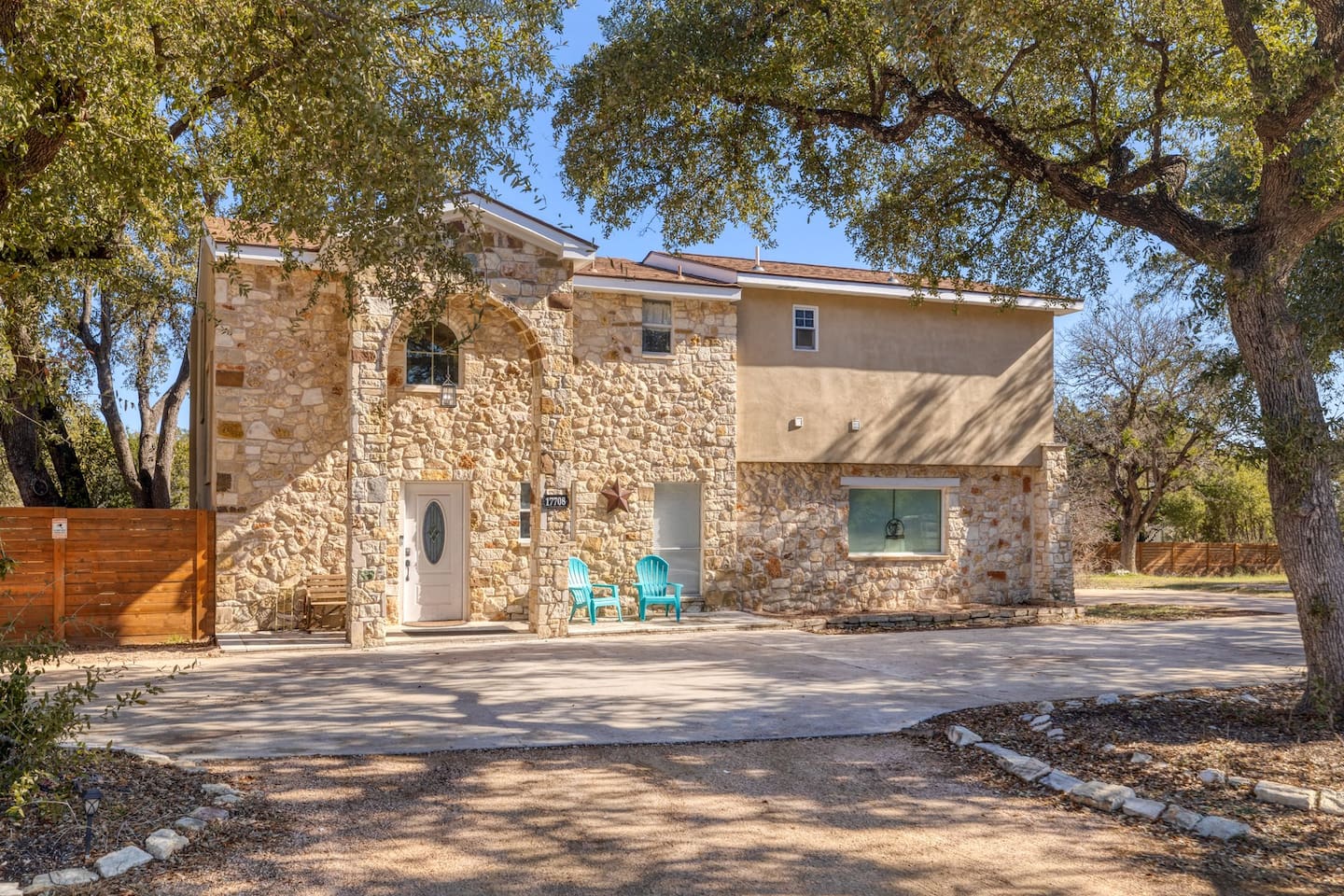 Surrounded by mature trees and timeless stonework, this spacious retreat blends Hill Country charm with modern comfort. From the moment you arrive, the peaceful setting invites you to slow down and settle in.