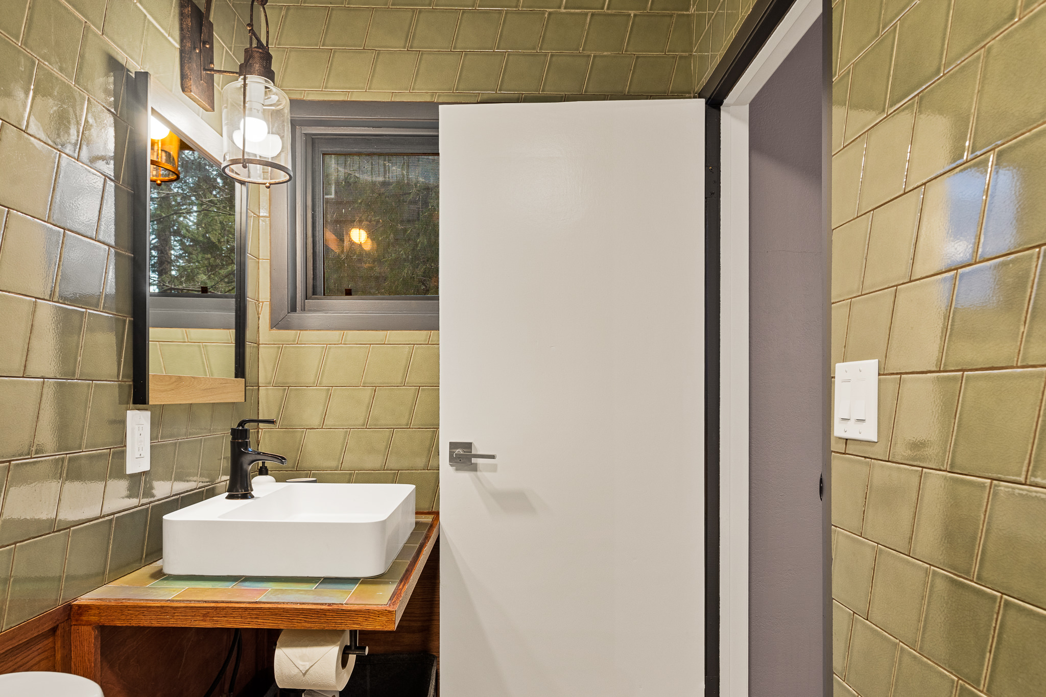 Modern touches in this bathroom give you the feeling of luxury while nestled in the Treetops of Lake Arrowhead.