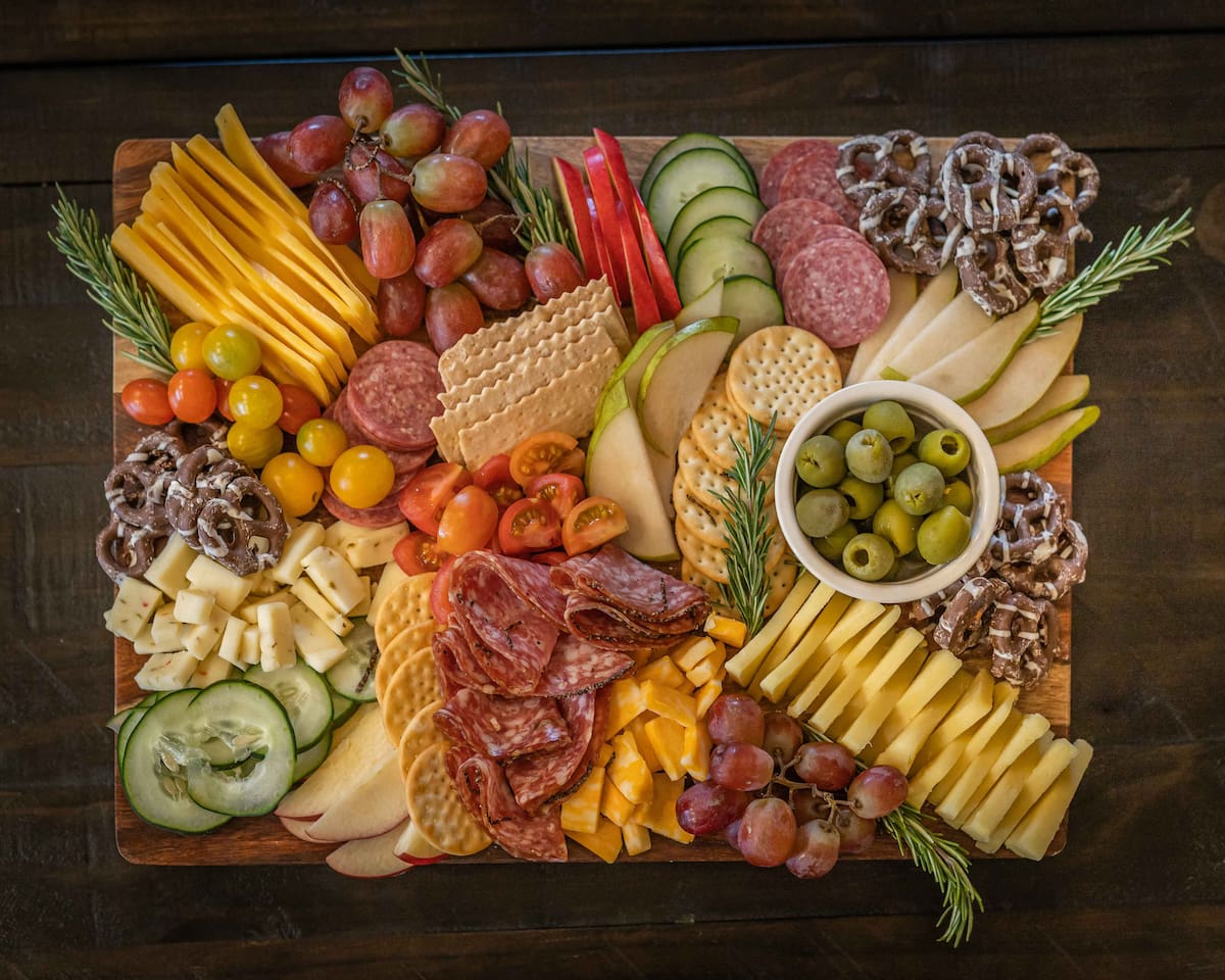 Pre-order Your "Savory" Charcuterie Board - Contact Your Host Anytime for a fresh board delivered to your door.
(6-8 Person board featured other sizes available)