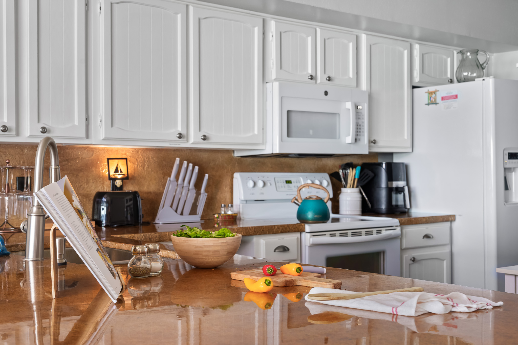 Whip up your favorite meals in this bright and fully stocked kitchen, where everything you need is right at your fingertips. Whether you’re cooking a big family dinner or prepping snacks for the lake, this space is made for effortless, homey moments.