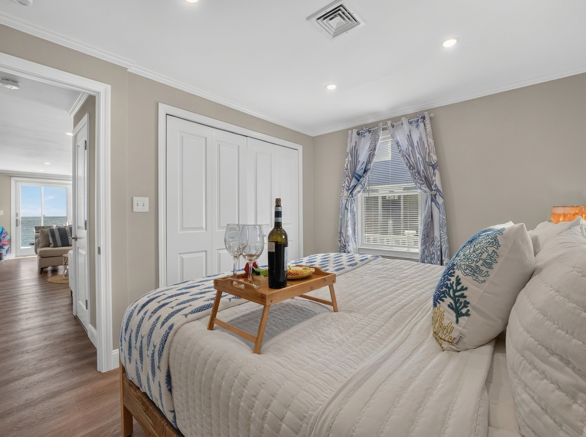 A cozy, inviting bedroom designed for restful nights after a day by the ocean.