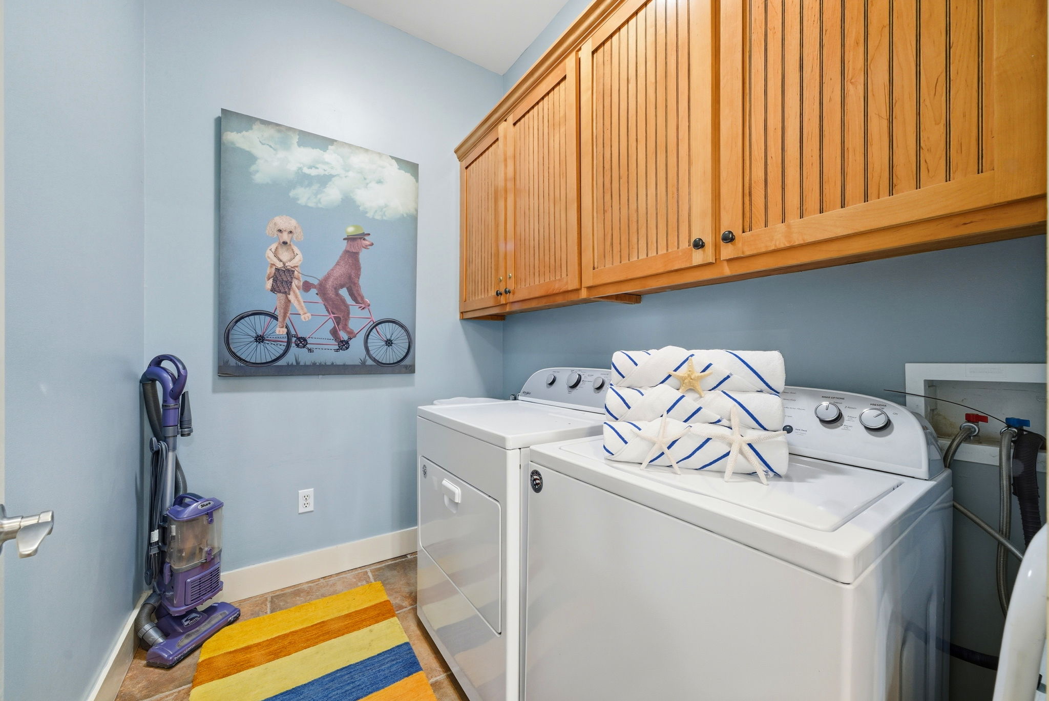 Because the only thing that should be 'sandy' is the beach—enjoy full access to our laundry room.