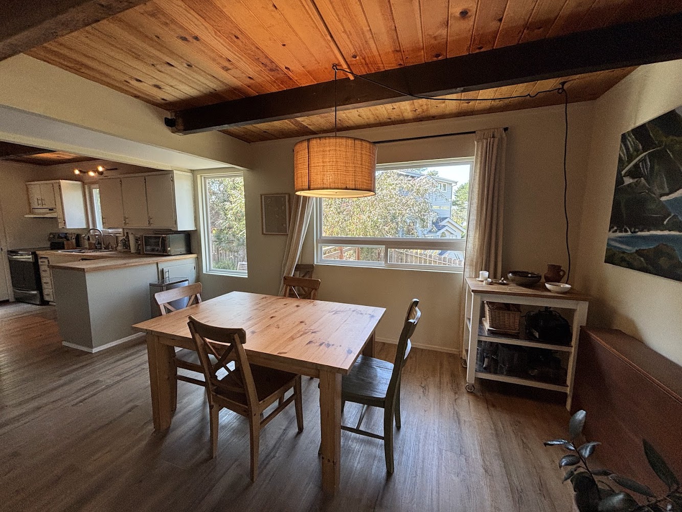 Dining area, kitchen on left