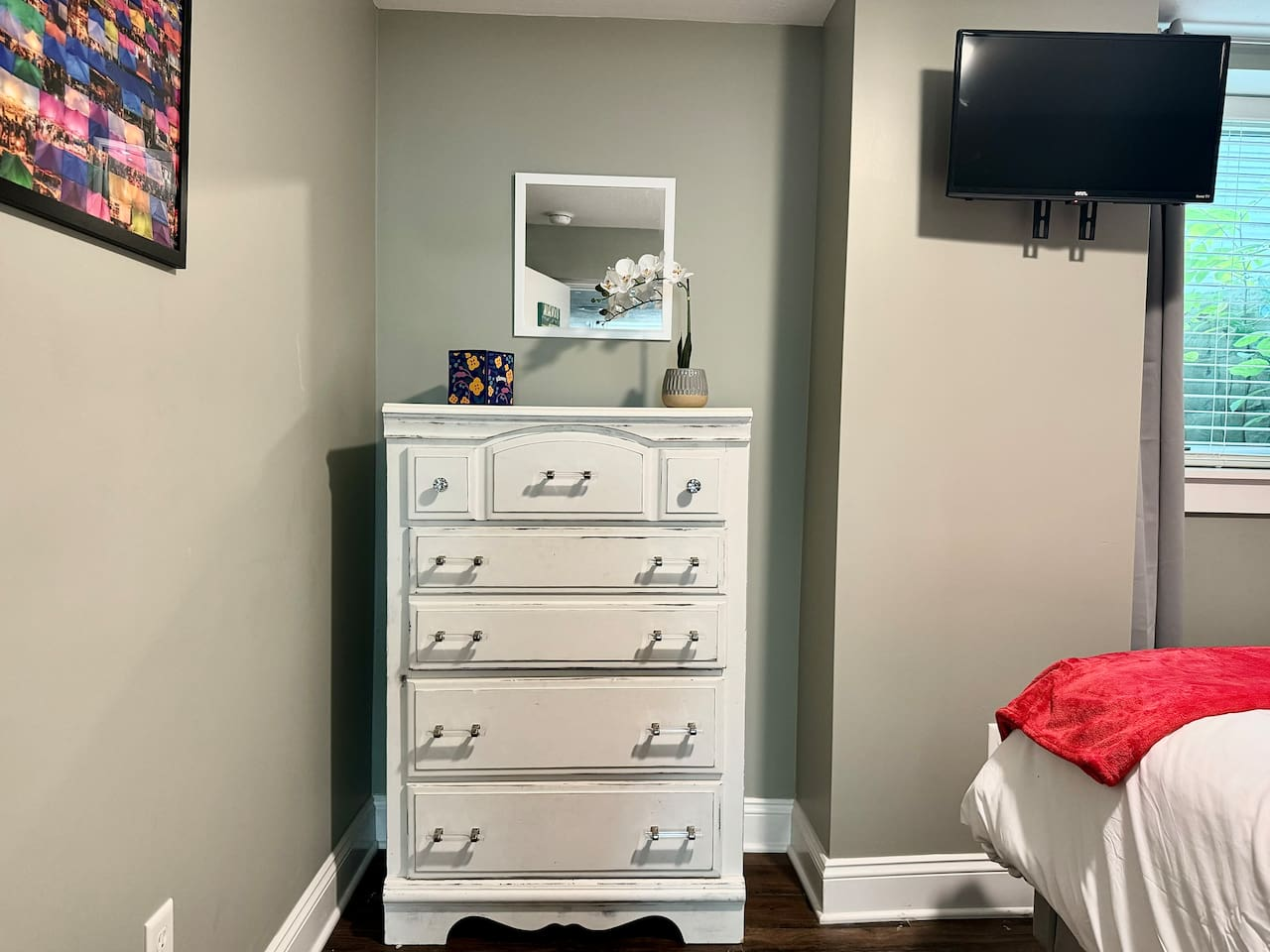 Unpack and stay a while with storage space in the dresser and closet.