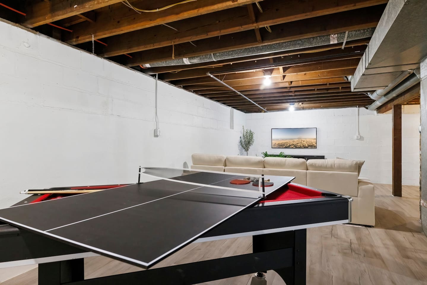 Ping-pong and pool table in the game room