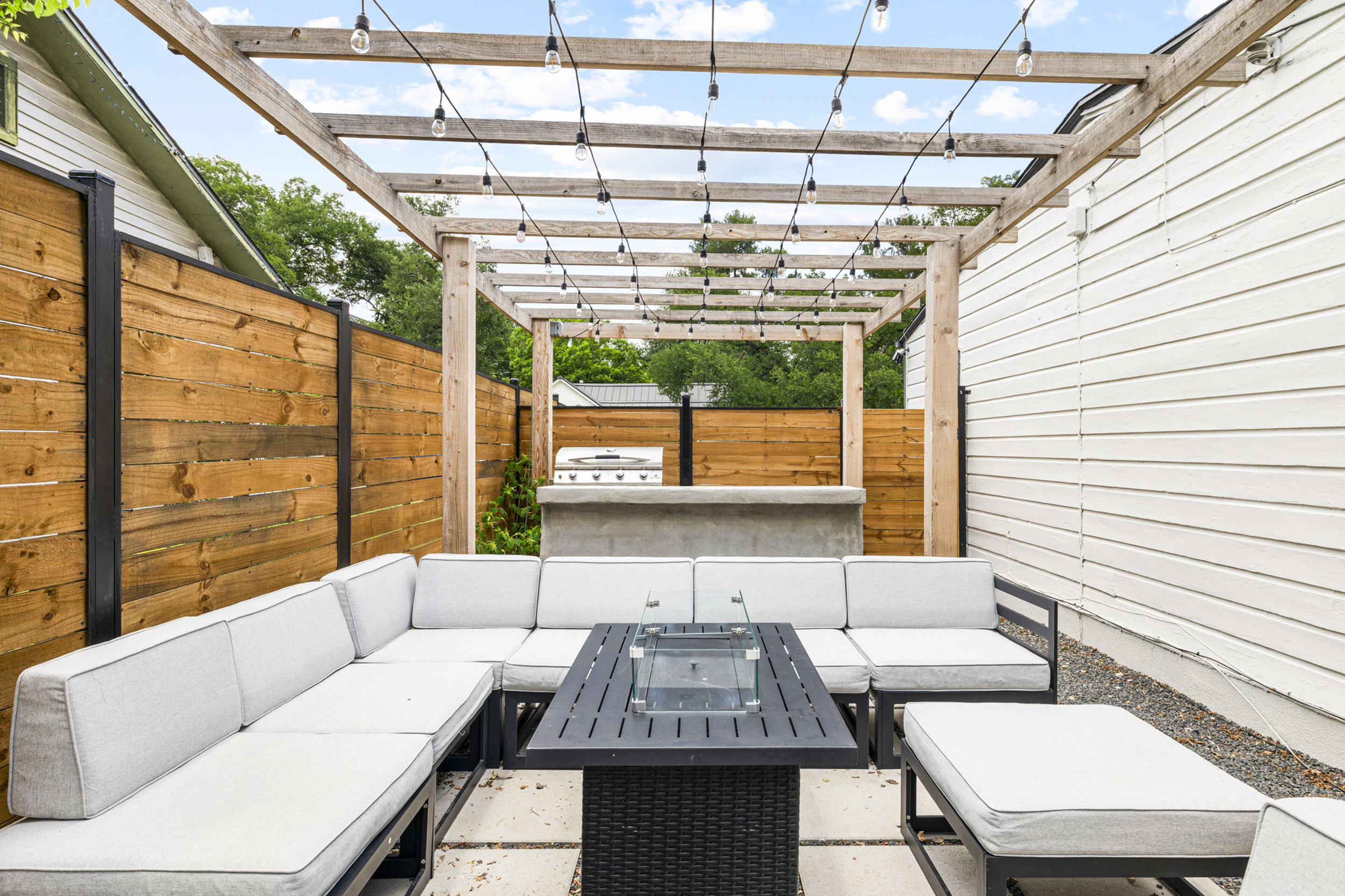 Stylish seating and ambient lighting create the perfect spot for evening gatherings!